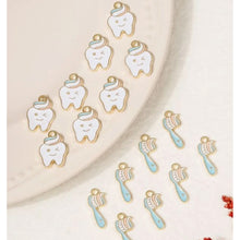 Load image into Gallery viewer, Tooth Fairy's Dream Pendant Set – Set of 11 Whimsical Tooth & Fairy Charms for Crafts & Jewelry