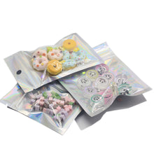 Load image into Gallery viewer, Iridescent Holographic Zip Lock Bags – Packs of 50 Stylish, Durable, and Secure Storage