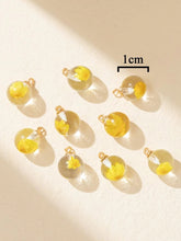 Load image into Gallery viewer, Yellow Floral Resin Cast Pendant – Set of 4 Sun-Kissed Charm for Jewelry & Crafts